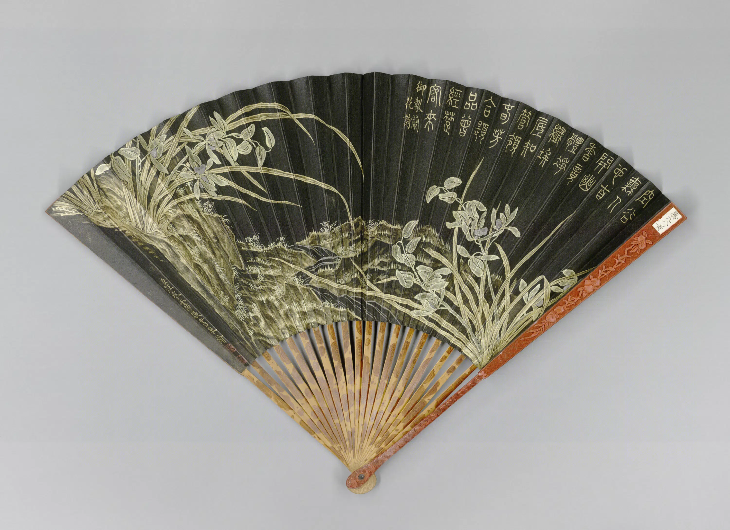 清代【汪承霈】《画兰花并书诗成扇》