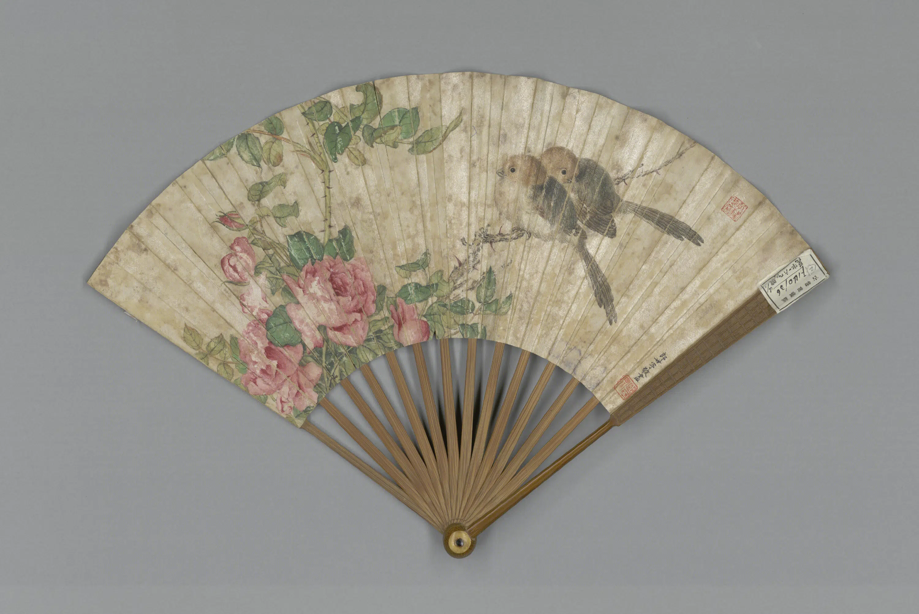 清代【吴应枚】《郎世宁画花鸟吴应枚书诗成扇》