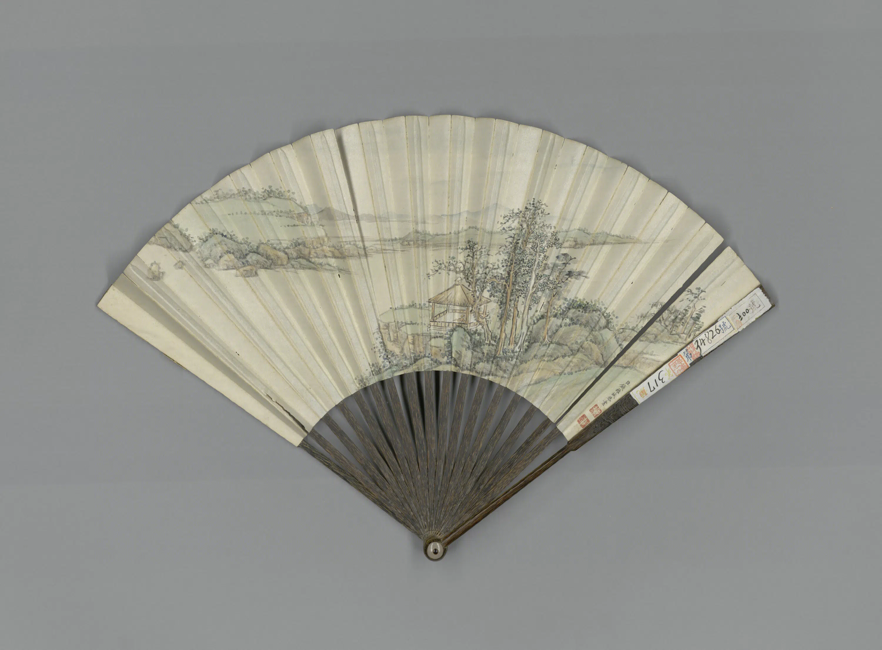 清代【钱维城】《画山水王燕绪书江山风雨歌成扇》
