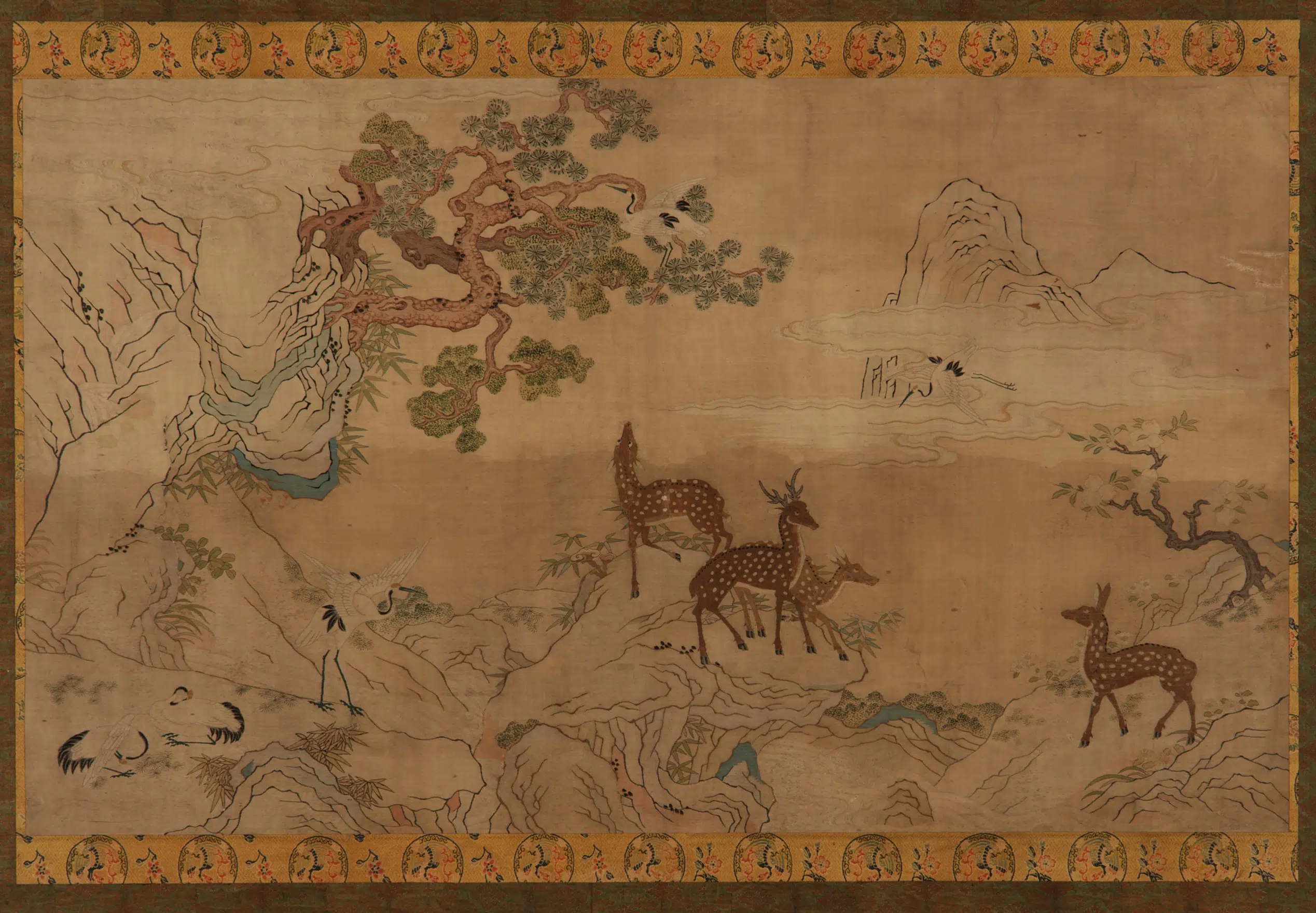 《缂丝松桃鹿鹤山水图》